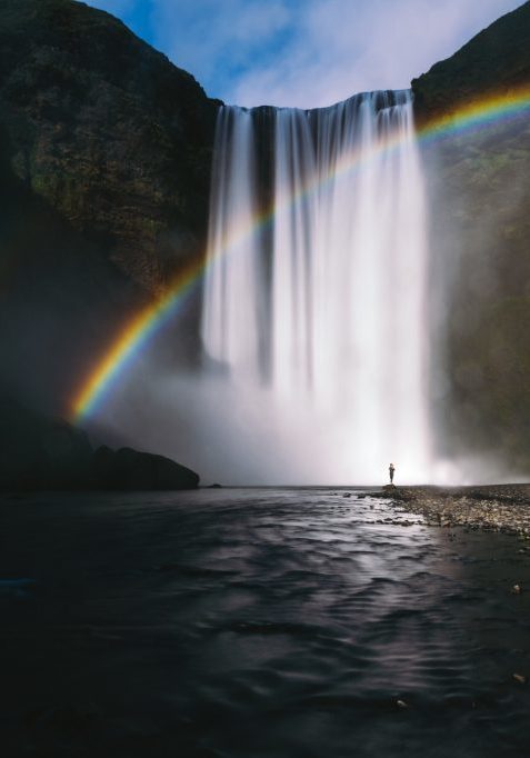 rainbow over a waterfall